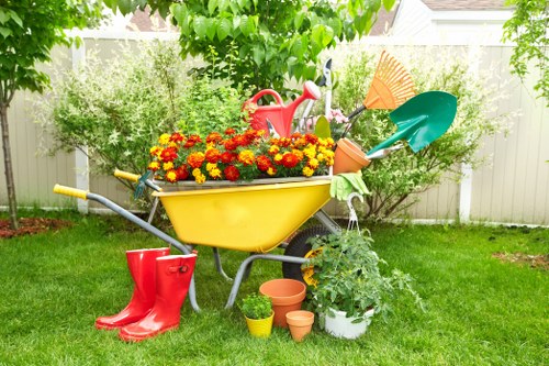Professional gardener reviewing booking details